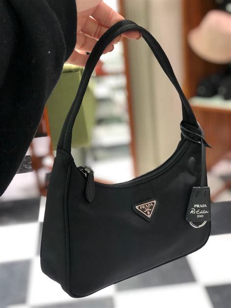 re nylon mini bag prada|Prada brushed leather mini pouch.